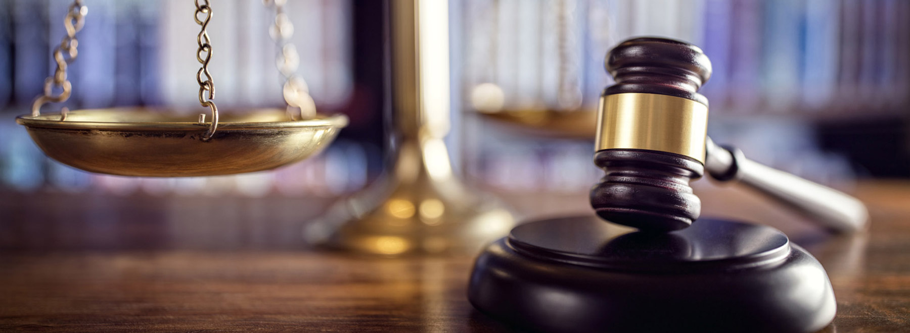 Scales of justice beside a judge's gavel